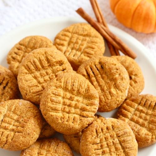 no bake gluten free pumpkin cookies 2 | Milk & Honey Nutrition plate of pumpkin cookies healthy no bake dessertswith mini pumpkin