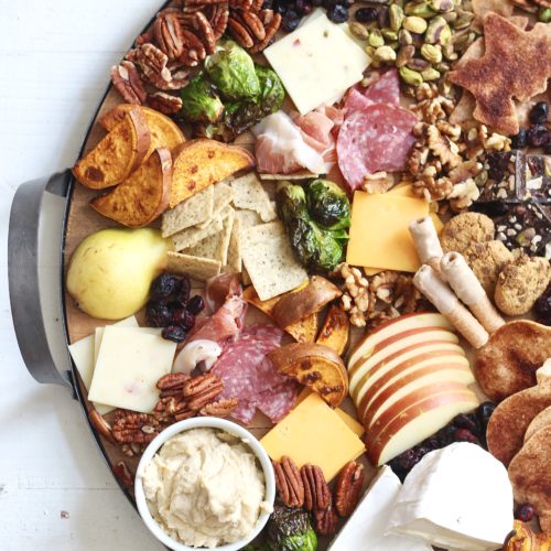 fullsizeoutput_cc03 | Milk & Honey Nutrition fall charcuterie board on round wood and metal platter