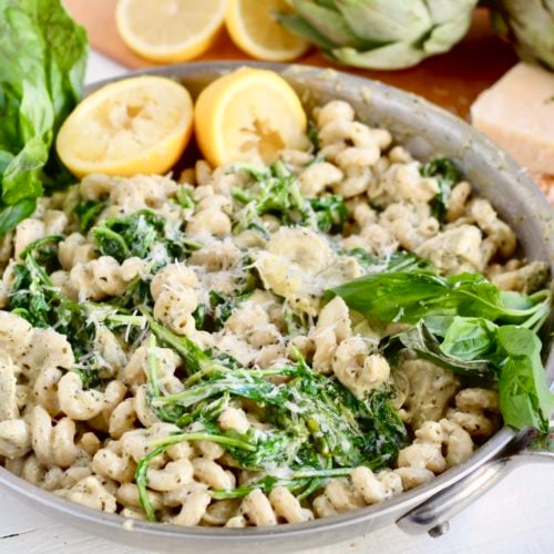 Artichoke Lemon Pesto Chickpea Pasta 2 | Milk & Honey Nutrition artichoke pesto pasta in stainless steel pan