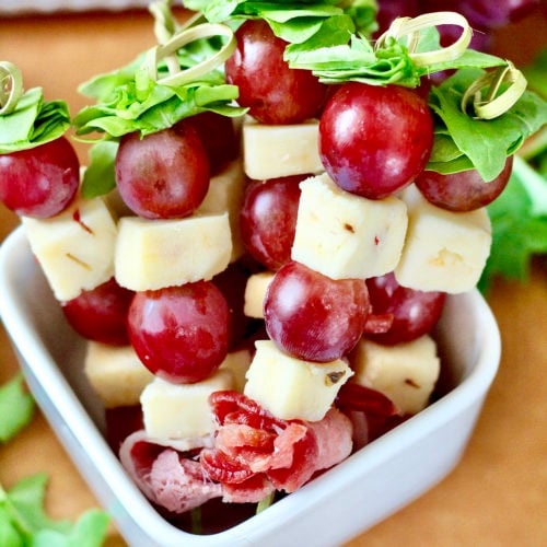 cheese and grapes 1 | Milk & Honey Nutrition pepperjack cheese and grapes skewers with red grapes in white bowl